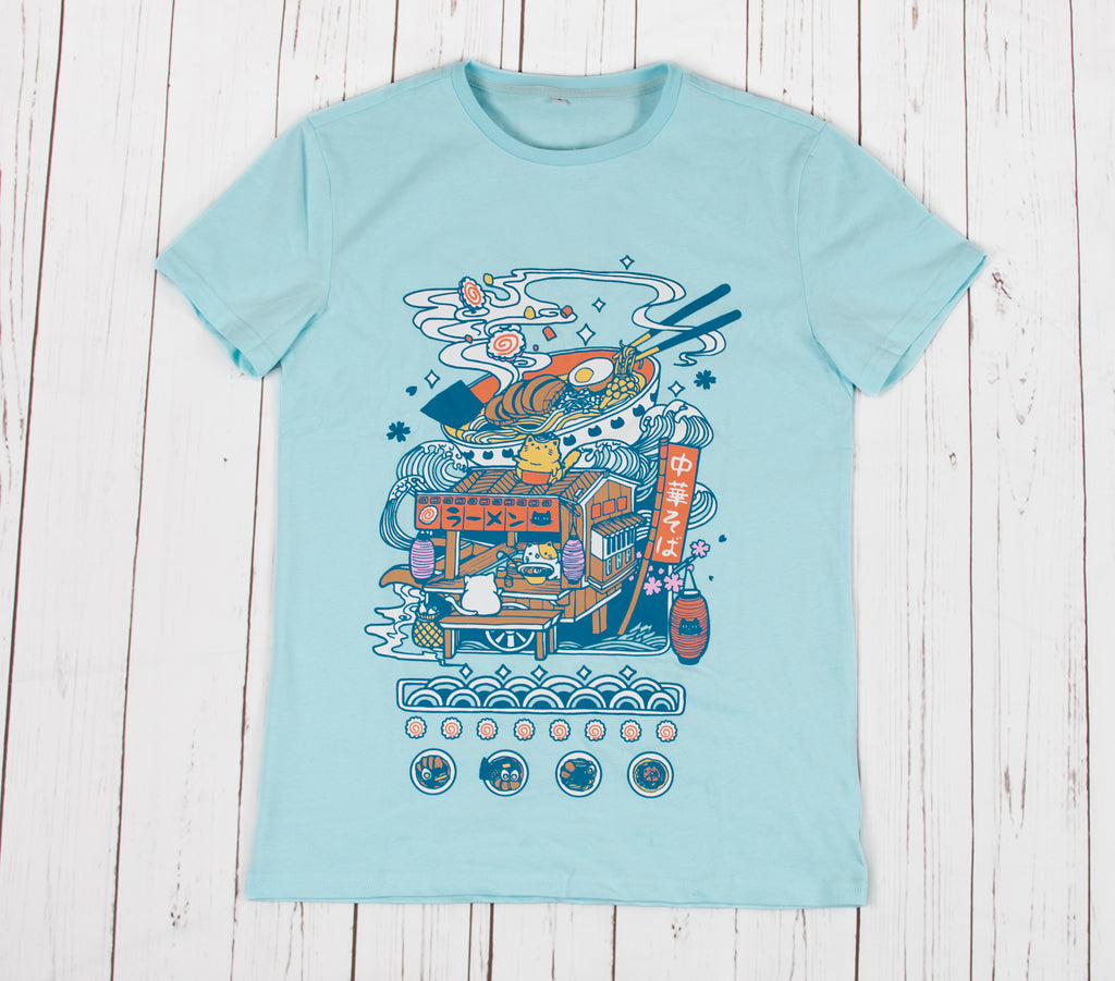 The mint color t-shirt features a front side design of a traditional Japanese mobile Ramen stall with cat chefs and customers. There is also a big bowl of ramen floating above the ramen cat stall, which is a secondary highlight of the design. The shirt is made of 100% stretchy cotton and is available from XXS to 2XL.